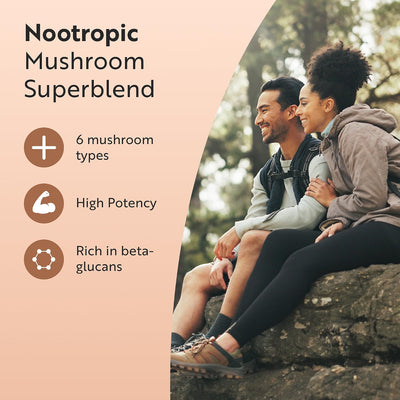 Promotional graphic for Nootropic Mushroom Superblend showing a peach-colored text panel on the left with product benefits and a lifestyle photo of a couple sitting outdoors on a rock on the right.
