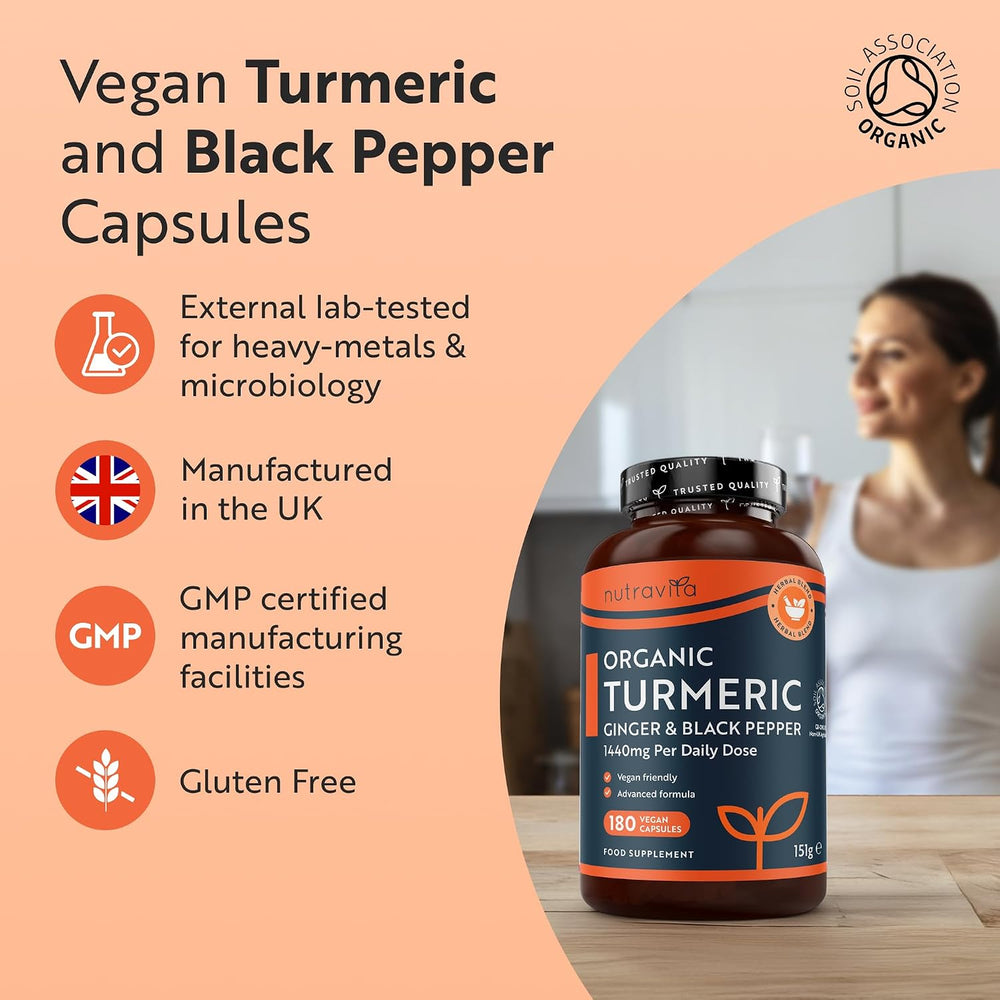 Bottle of Nutravita Organic Turmeric Ginger & Black Pepper supplement with product details on a peach background.