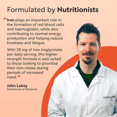 Promotional graphic for Nutravita iron supplement featuring a portrait of nutritionist John Lukey on the right, with text on the left explaining the importance of iron for red blood cells and energy production. The background is a soft peach color with a bold orange abstract shape, and the Nutravita logo is visible on the coat and as a watermark.