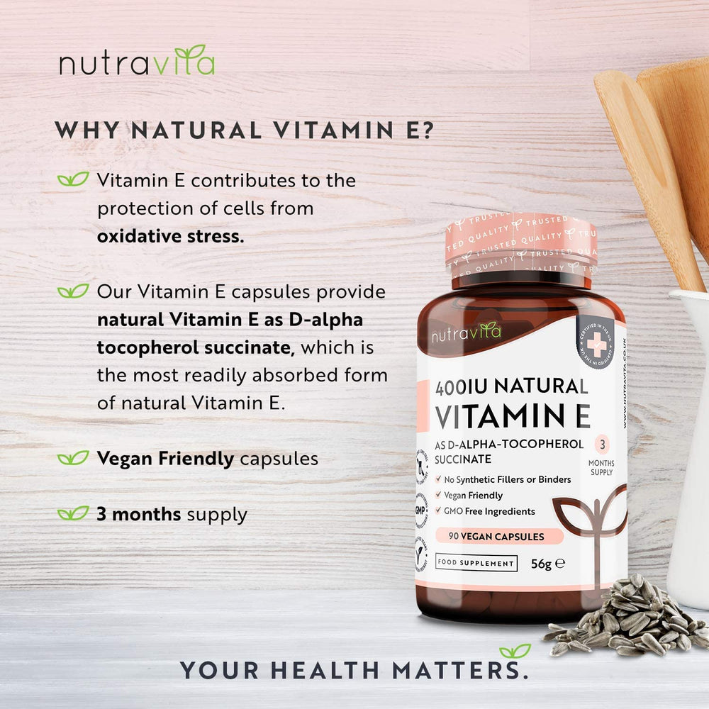 Nutravita Vitamin E supplement bottle with text on a light wooden background