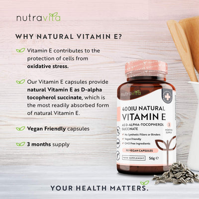 Nutravita Vitamin E supplement bottle with text on a light wooden background